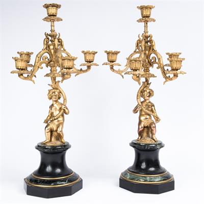 Lot 110 - A pair of French gilt metal candelabra