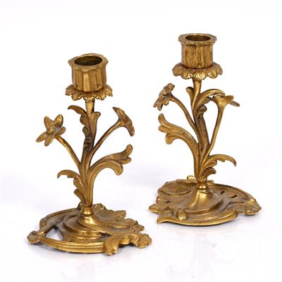 Lot 112 - A pair of French gilt metal Rococo style candlesticks