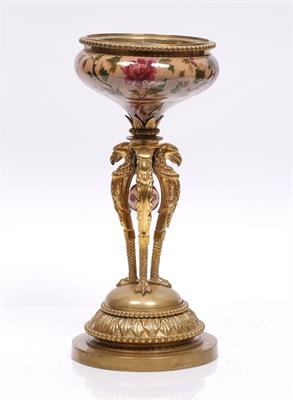 Lot 120 - A Victorian gilt metal and porcelain oil lamp base