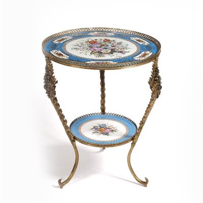 Lot 261 - A French porcelain two tier occasional table