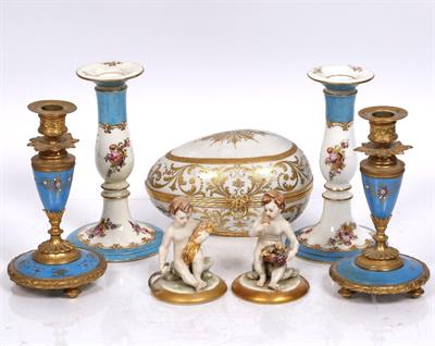 Lot 270 - Two pairs of porcelain candle sticks