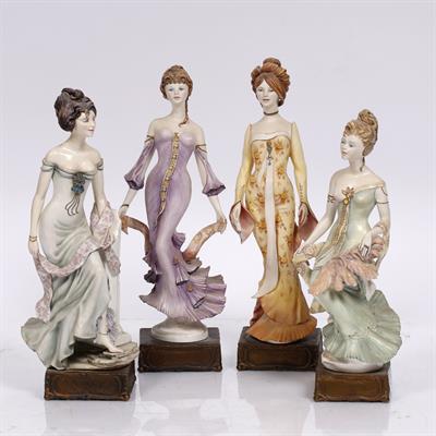 Lot 300 - A set of four Art Nouveau series porcelain figures