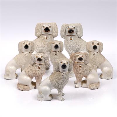 Lot 323 - A collection of eight Victorian model poodles