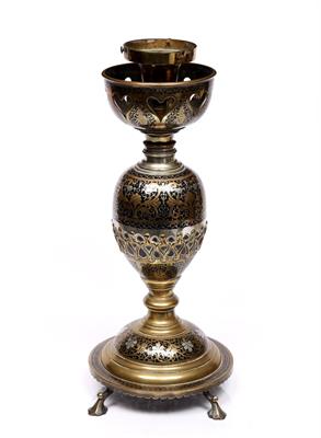 Lot 369 - An Indian inlaid brass and silvered metal lamp