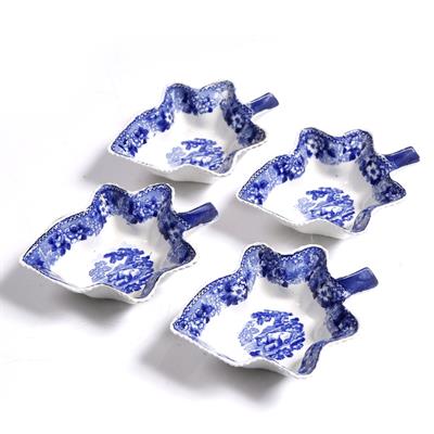 Lot 372 - A set of four blue transfer pickle dishes