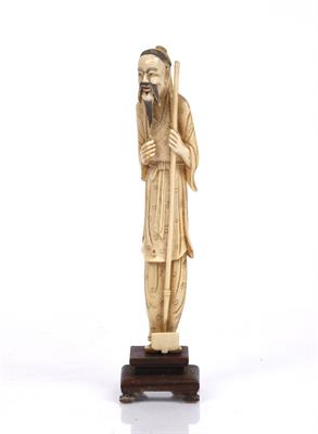 Lot 393 - A Chinese ivory carved male figure