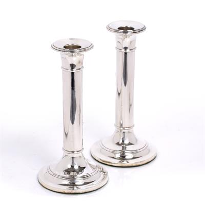 Lot 416 - A pair of silver candlesticks