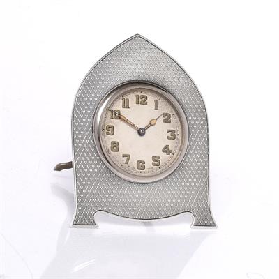 Lot 424 - A silver mounted bedroom clock