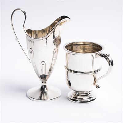 Lot 425 - A small silver tankard