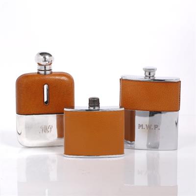 Lot 428 - Three various silver plated hip flasks