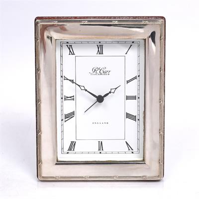 Lot 430 - A clock with silver mount