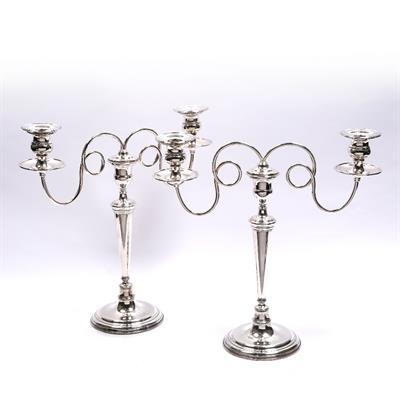 Lot 432 - A pair of Georgian candlesticks