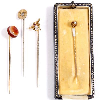 Lot 433 - A collection of four various Victorian and other stick pins