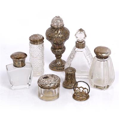 Lot 466 - A small collection of various silver topped bottles