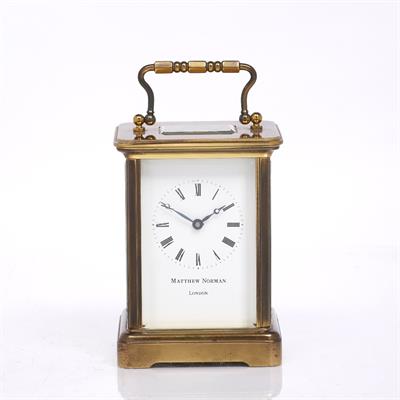 Lot 472 - A brass carriage clock
