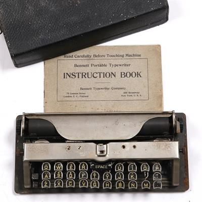 Lot 479 - A cased Bennett portable typewriter