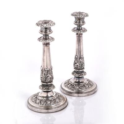 Lot 489 - A pair of Georgian silver plated candle sticks
