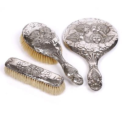 Lot 507 - A Victorian silver backed three piece dressing table set