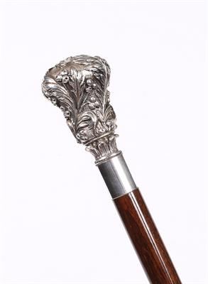 Lot 509 - A silver gilt and malacca cane