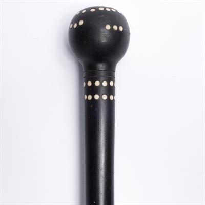 Lot 517 - An Indian ebony and ivory inlaid walking cane