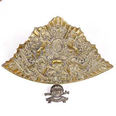 Lot 82 - A 19TH CENTURY PRESSED BRASS CAP BADGE