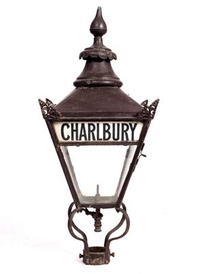 Lot 125 - AN EARLY 20TH CENTURY BROWN PAINTED 'CHARLBURY' STATION LANTERN