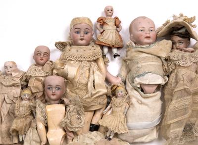 Lot 177 - A GROUP OF ANTIQUE CONTINENTAL BISQUE HEADED DOLLS