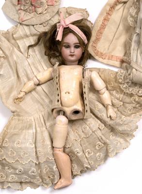 Lot 178 - A FRENCH BISQUE HEADED PORCELAIN DOLL