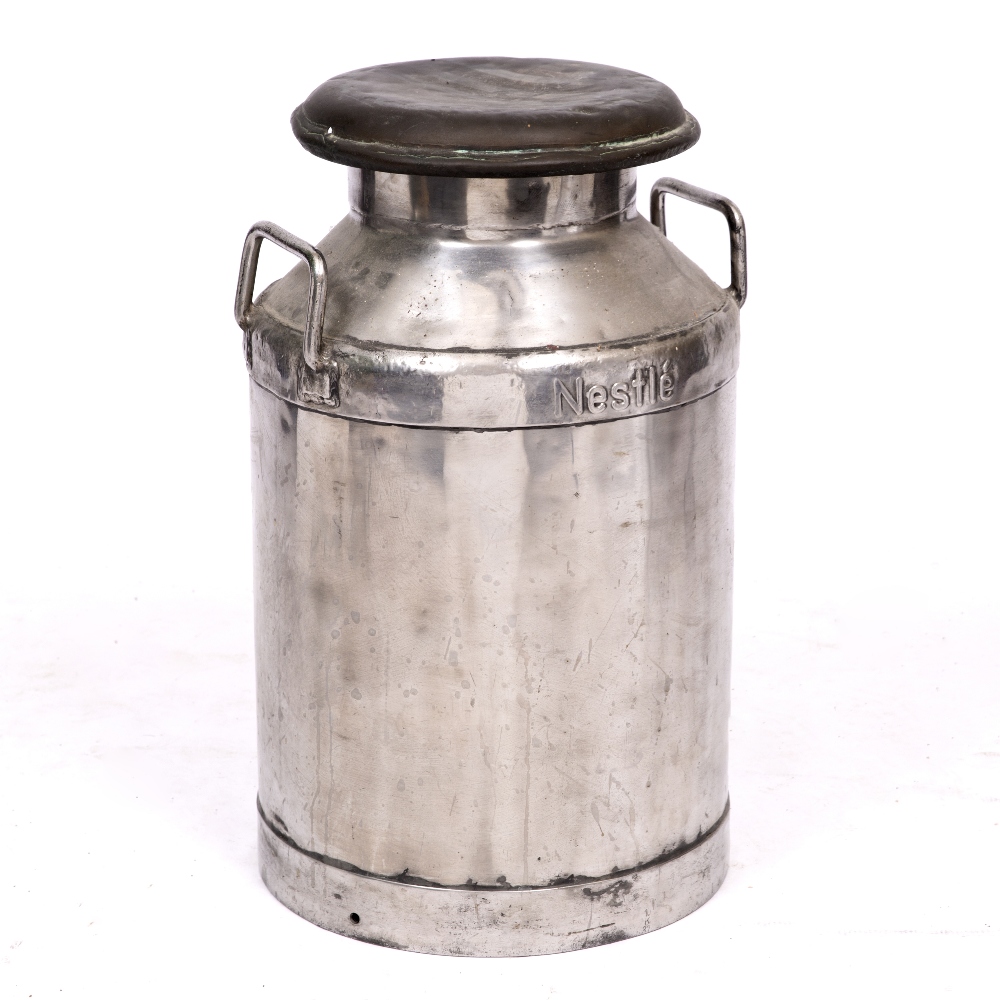 Lot 275 - A 20TH CENTURY NESTLE ADVERTISING MILK CHURN