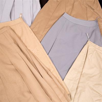 Lot 358 - A SELECTION OF 'A' LINE PLEATED AND ROUNDED SKIRTS