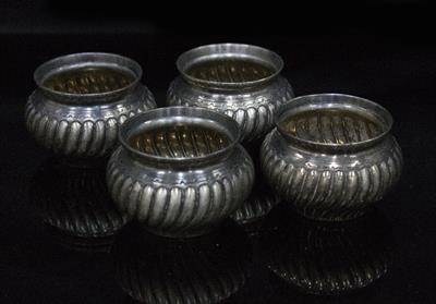 Lot 409 - A SET OF FOUR VICTORIAN SILVER SALTS