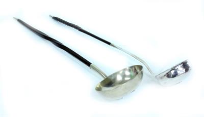 Lot 411A - A 19TH CENTURY WHITE METAL TODDIE LADLE