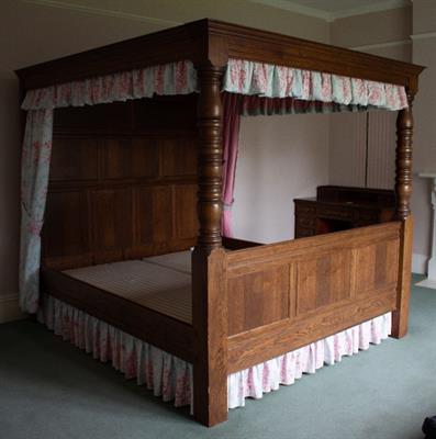 Lot 447 - A 17TH CENTURY STYLE OAK FOUR POSTER OR CANOPY BED