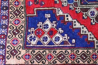 Lot 448 - A SMALL RED GROUND ORIENTAL RUG