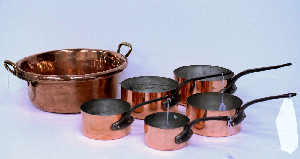 Lot 504 - A SET OF FIVE GRADUATED COPPER PANS