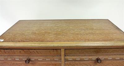 Lot 546 - A HEATHLAND FURNITURE LIMED OAK CHEST OF TWO SHORT AND FOUR LONG DRAWERS
