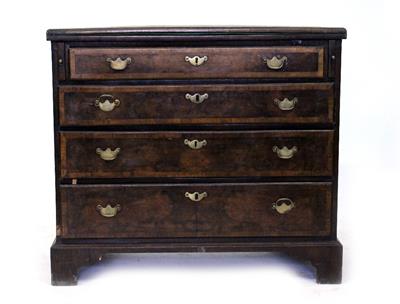 Lot 556 - A 19TH CENTURY GEORGIAN STYLE WALNUT VENEERED CHEST