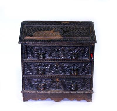 Lot 570 - A LATE 19TH CENTURY CARVED OAK BUREAU