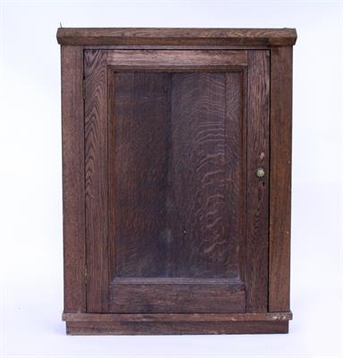 Lot 578 - A NARROW OAK WALL CUPBOARD