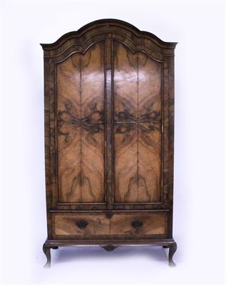 Lot 589 - A FIGURED WALNUT WARDROBE