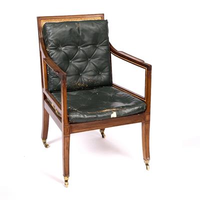 Lot 610 - A REGENCY STYLE MAHOGANY BERGERE LIBRARY ARMCHAIR