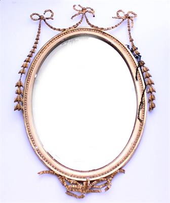 Lot 612 - A 19TH CENTURY NEO-CLASSICAL GILTWOOD OVAL HANGING WALL MIRROR