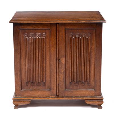 Lot 617 - AN OAK TABLE CABINET