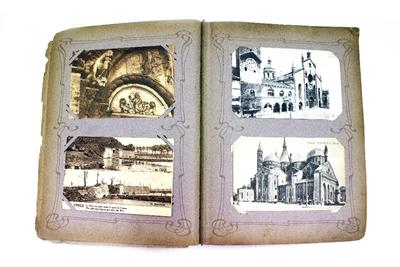 Lot 635 - AN ALBUM CONTAINING A COLLECTION OF 128 OLD POSTCARDS