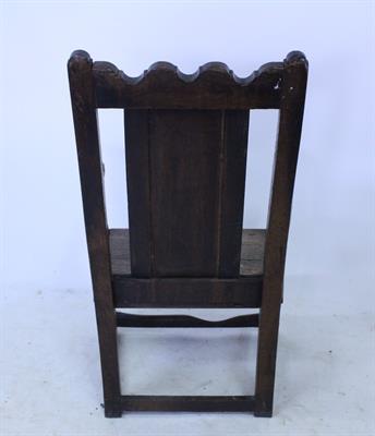 Lot 657 - AN ANTIQUE OAK WAINSCOT CHAIR