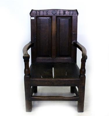 Lot 658 - AN ANTIQUE OAK WAINSCOT CHAIR