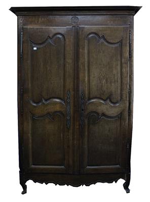 Lot 823 - AN OLD CONTINENTAL OAK TWO DOOR ARMOIRE