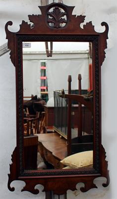 Lot 836 - A GEORGE III STYLE WALNUT FRET FRAMED WALL MIRROR