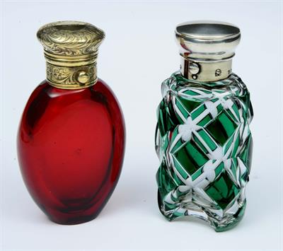 Lot 57 - A VICTORIAN RUBY GLASS AND SILVER GILT MOUNTED SCENT BOTTLE