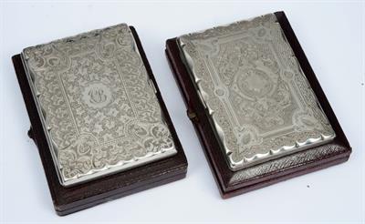 Lot 91 - A VICTORIAN SILVER CARD CASE with shaped sides and engraved cartouches with foliate surrounds